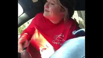 Busty teen sucks and swallows in car